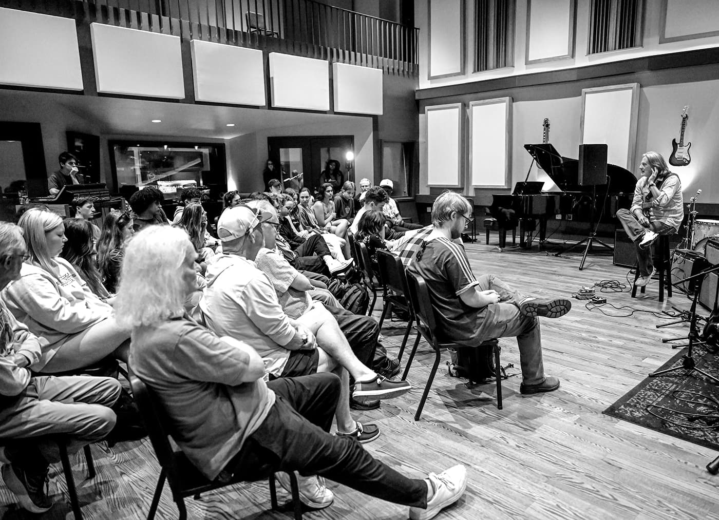 Black and white photo of a workshop session in the studio